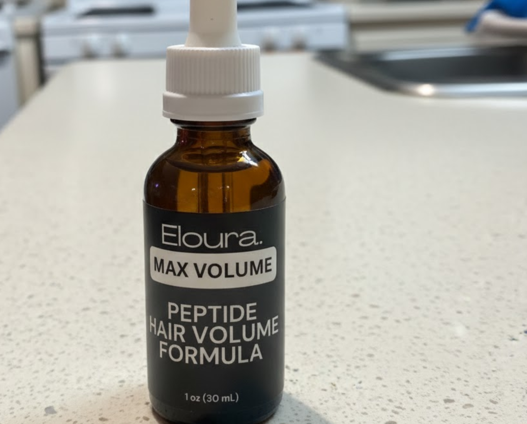 Eloura Max Volume volumizing hair serum review from Imani about soft, full, healthy-looking hair